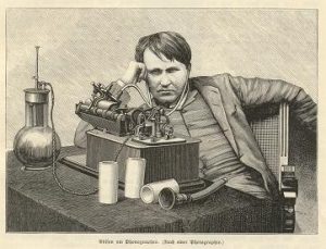 Thomas Alva Edison pictured with his invention